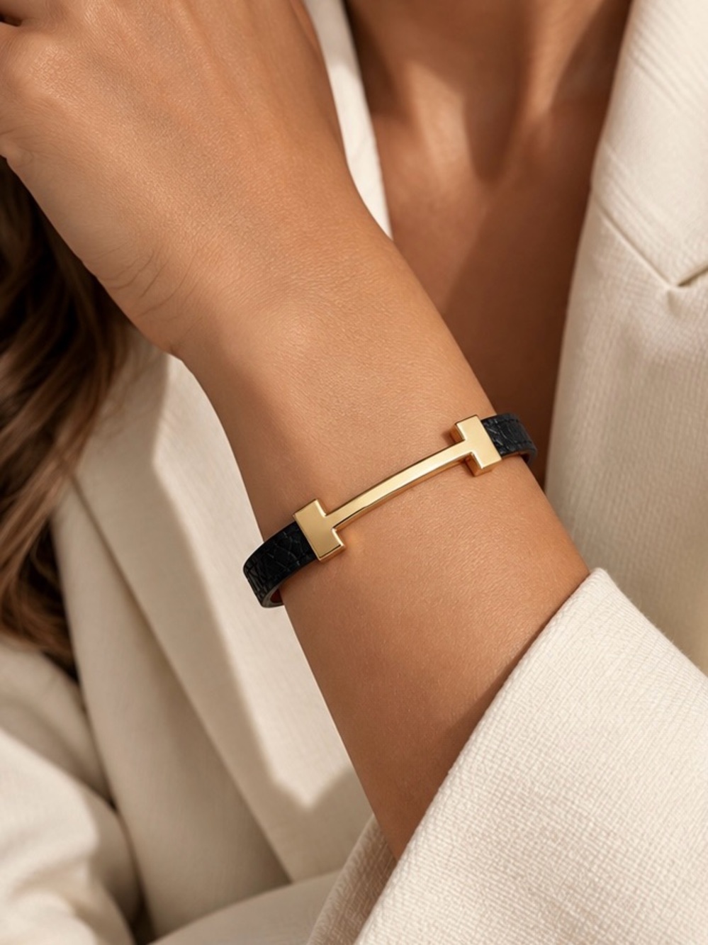 Sculptural Gold and Black Leather Bracelet Elegant Minimalist Luxury Jewelry